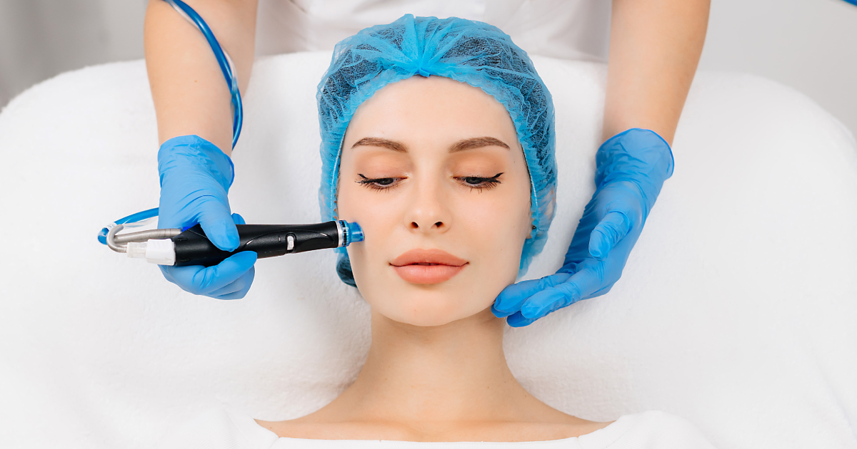 Woman receiving HydraFacial treatment at skincare clinic in Old Bridge, NJ